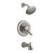 A close up of a stainless steel Delta faucet and shower head.