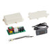 A white electronic control kit with a digital display and wires.