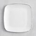 A white square Visions plastic plate with silver trim.