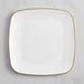 A white square Visions plastic plate with gold trim.