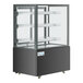 An Avantco black refrigerated bakery display case with glass shelves.