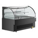An Avantco black horizontal air curtain merchandiser with a clear glass top.