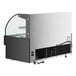 An Avantco black horizontal air curtain merchandiser with LED lighting and a glass door.