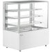 An Avantco white refrigerated bakery display case with glass shelves on wheels.