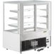 An Avantco white refrigerated bakery display case with glass doors and two shelves.