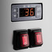 An Avantco horizontal air curtain merchandiser with a digital display and switches.
