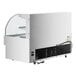 A white horizontal air curtain merchandiser with a glass door.