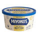 A container of Miyoko's European-Style Cultured Salted Oat Milk Vegan Butter with a blue lid and blue and white label.