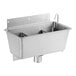 A stainless steel Regency ice cream dipper well with two compartments on a counter.