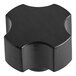 A black square plastic knob with a star shape.