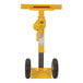 A yellow metal Vestil stabilizing jack with black wheels.