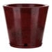 A Floridis red marble planter with a black base.