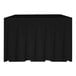 A black rectangular object on a white surface.