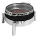 An EcoBurner Xylo black and stainless steel waterless chafer on a counter with a hinged glass lid.