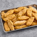 Gardein Plant-Based Vegan Breaded Chick'n Tenders on a tray.