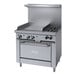 A large stainless steel Garland range with two burners, a griddle, and a convection oven.