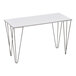 A rectangular display table with a white melamine top and black hairpin legs.