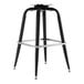 A black Lancaster Table & Seating bucket barstool frame with metal legs.