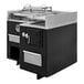 A black and silver J & R Manufacturing Robata Grill on a counter.