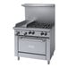 A large stainless steel Garland range with 4 burners, a griddle, and a convection oven.