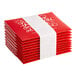 A stack of red Aunt Flow menstrual pads with white writing.