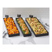 An American Metalcraft black rectangular metal market tray with pasta and vegetables on it.