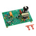 A green circuit board with many different components.