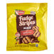 A yellow bag of KEEBLER Fudge Stripes Minis with a close up of a cookie.