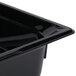 A black plastic Vollrath food pan with a lid on a counter.