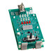 A green Vulcan assembly circuit board with red and white lights.