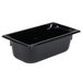 A black rectangular Vollrath plastic food pan with a lid.