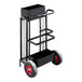 A black and red strapping cart with wheels.