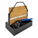 A white tool box with a blue handle containing a steel strap caddy.