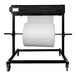 A large roll of paper on a black metal stand.