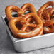 A tray of Ditsch Authentic German frozen soft pretzels.