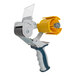 A yellow and blue Encore Packaging Deluxe 3" Pistol-Grip Tape Dispenser with a handle.