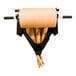 A 15" paper roll on a steel wall-mount paper dispenser.