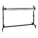 A metal rolling rack with a long black rod.