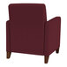 A burgundy Lesro Ravenna guest arm chair with walnut wood legs.