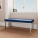 A Lesro Newport blue bench with metal legs.