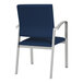 A Newport Patriot Plus navy blue chair with silver legs.