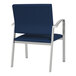 A navy blue Lesro Newport oversized guest chair with silver legs.