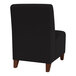 A Lesro Ravenna black fabric guest chair with walnut wood legs.