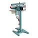 An 18-inch impulse heat foot-operated bag sealer with a timer, featuring a sturdy metal stand and an attached power cord.