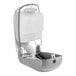A white and silver Lavex Pro manual foam soap dispenser with a plastic container.
