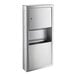 A stainless steel rectangular box with a rectangular opening for paper towels and a door on top.