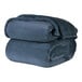 A stack of Cadet Blue Berkshire Hospitality King Size blankets.