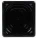 A black Vollrath Super Pan 1/6 size black polycarbonate food pan with a lid on it.