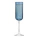 A Libbey blue flute wine glass with a small amount of blue liquid in it.