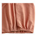 A close up of a paprika Berkshire Hospitality Helix box spring cover.